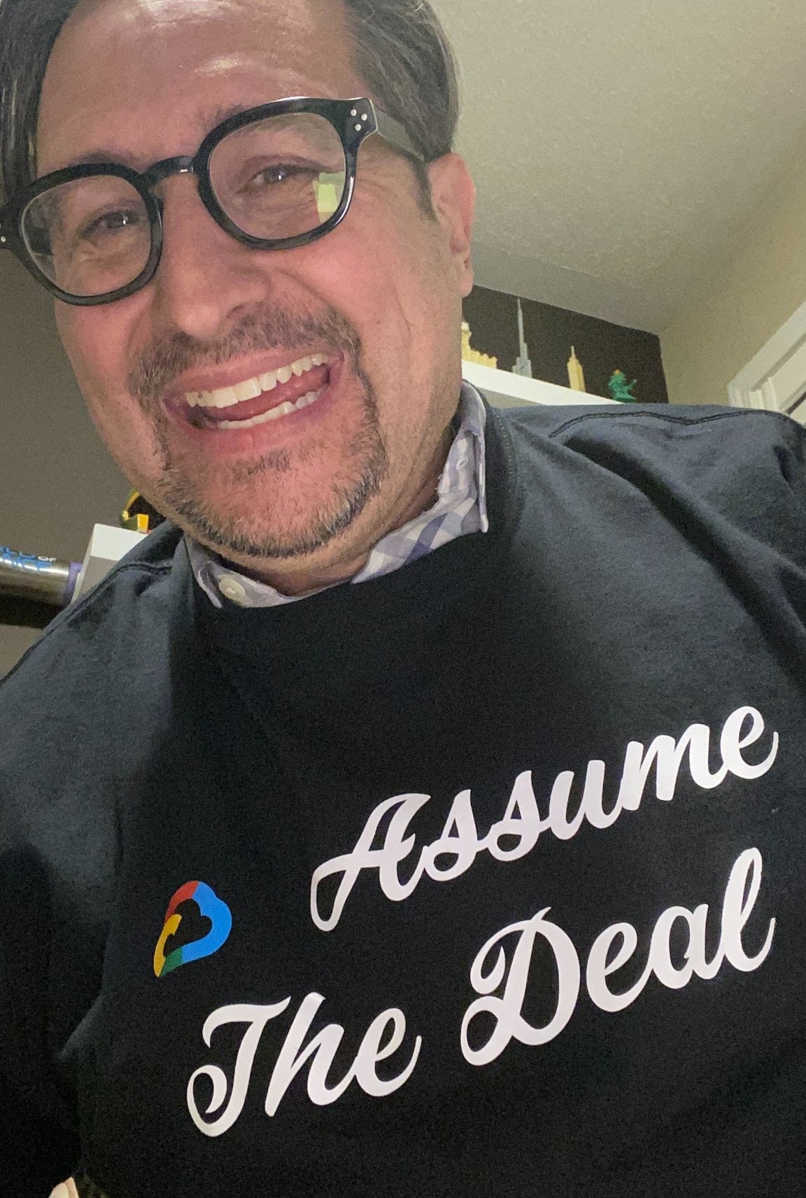 Wearing the Assume The Deal sweater